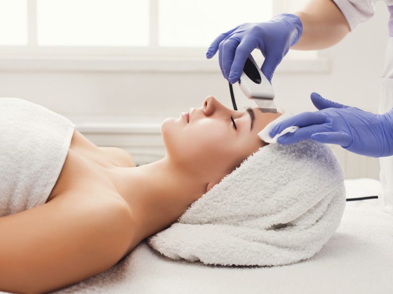 woman-getting-facial-treatment-at-beauty-salon.jpg